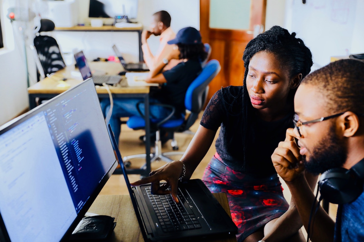 Professional skills training environment with students learning computer skills